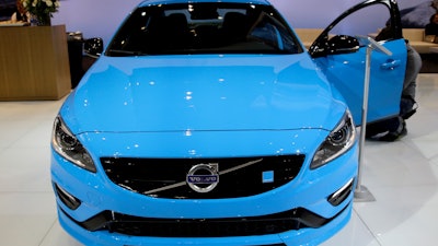 In this Feb. 6, 2014, file photo, Volvo displays the S60 Polestar during the media preview of the Chicago Auto Show at McCormick Place in Chicago. Volvo’s performance electric car brand, Polestar, has opened a factory in China to produce a gasoline-electric hybrid for export to Europe and the United States.