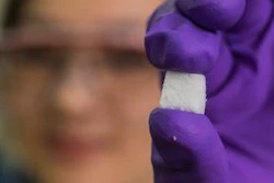 Rice University postdoctoral researcher Pei Dong holds a sample of SAC, a new form of self-adapting composite. The material has the ability to heal itself and to regain its original shape after extraordinary compression.