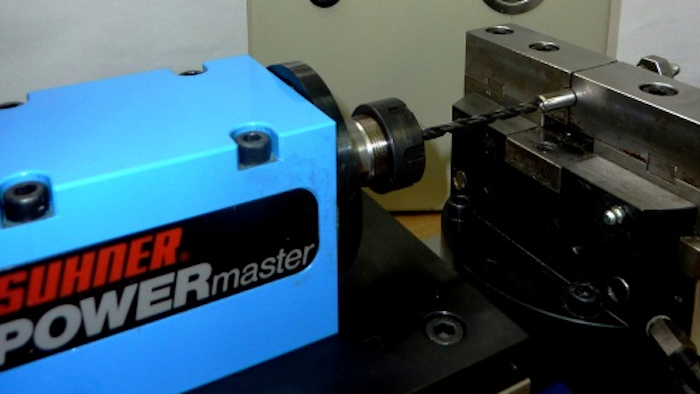 Drilling an 8 mm (D) hole in stainless steel 25 mm deep using a carbide tool with coolant-through capability, an AccuLube-Booster, and a BEX 15 machining unit.