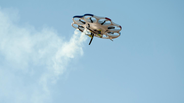 Drone America's DAx8 multi-rotor aircraft deploys two cloud seeding flares during a recent flight test in Reno.