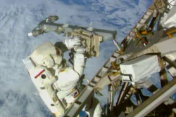 In this Sunday, March 1, 2015 image made from video provided by NASA, astronaut Terry Virts installs an antenna and boom during a spacewalk outside the International Space Station. On Friday, Feb. 19, 2016, NASA announced it received a record number of applicants _ some 18,300 _ for its next astronaut class. That’s more than double the previous record of 8,000 for the first space shuttle astronaut class in 1978.