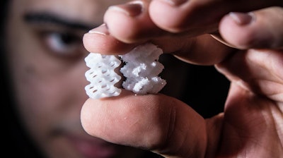 Unlike most commercial SLS platforms, Rice University's OpenSLS allows researchers to work with their own powdered materials, including specialized biomaterials like polycaprolactone, or PCL, a common nontoxic polymer that was used to print these tissue-engineering scaffolds. Researcher Ian Kinstlinger developed a method for smoothing the surfaces (left) of newly printed scaffolds (right) using vaporized solvent.