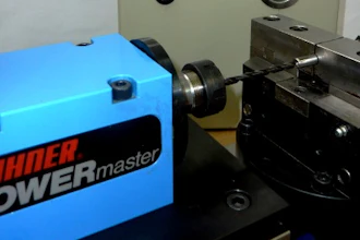 Drilling an 8 mm (D) hole in stainless steel 25 mm deep using a carbide tool with coolant-through capability, an AccuLube-Booster, and a BEX 15 machining unit.