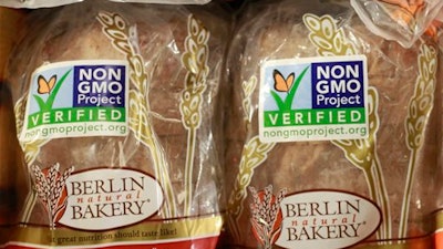 In this Oct. 5, 2012, file photo. froducts labeled with Non Genetically Modified Organism (GMO) are sold at the Lassens Natural Foods & Vitamins store in Los Feliz district of Los Angeles. The food industry is pressuring Congress to act before the state of Vermont requires food labels for genetically modified ingredients. (AP Photo/Damian Dovarganes, File)