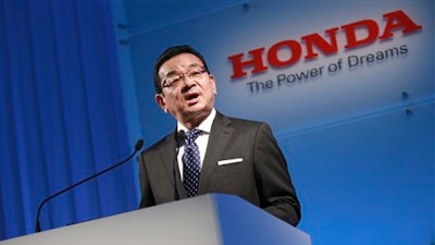 Honda Motor Co. President and Chief Exective Takahiro Hachigo speaks at a press conference in Tokyo, Wednesday, Feb. 24, 2016. Honda's president is sticking to its stance that the Japanese automaker plans no independent financial bailout for supplier Takata, which is embroiled in a massive recall crisis over air-bag inflators that may explode.