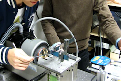 Ryan Harne (right), assistant professor of mechanical and aerospace engineering at Ohio State, and director of the Laboratory of Sound and Vibration Research, is the lead on a project that harvests energy from the plentiful vibration energy that surrounds us every day.