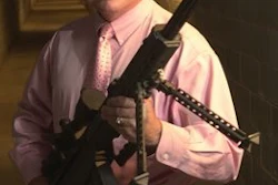 In this Oct. 21, 2005, file photo, Ronnie Barrett, founder of Barrett Firearms Manufacturing Inc., displays his company’s .50-caliber rifle inside a 100 meter test-firing tunnel at his facility in Murfreesboro, Tenn. The state Senate on Wednesday, Feb. 24, 2016, gave final approval to a resolution designating the firearm as Tennessee’s official state rifle.