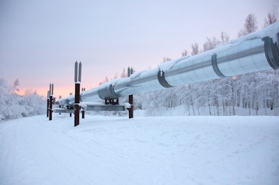 Trans Alaska Pipeline In Winter With Sunset 000056601690 Medium 56c5de7aedeb1