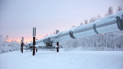 Trans Alaska Pipeline In Winter With Sunset 000056601690 Medium 56c5de7aedeb1