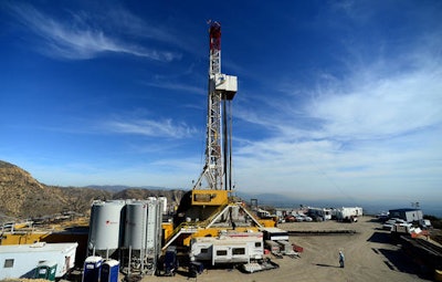 In this Dec. 9, 2015, file photo, crews work on stopping a gas leak at a relief well at the Aliso Canyon facility above the Porter Ranch area of Los Angeles. The gas-storage facility that spewed methane uncontrollably for almost four months, driving thousands of families from their homes, won't resume operations until it has undergone tougher tests than ever required before, a process that will take months and perhaps even longer.