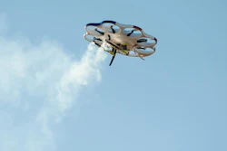 Drone America's DAx8 multi-rotor aircraft deploys two cloud seeding flares during a recent flight test in Reno.