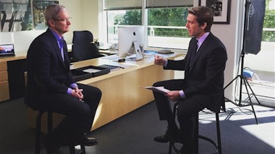 This image made from video and released by ABC News shows Apple CEO Tim Cook, left, during an exclusive interview with anchor David Muir, airing Wednesday, Feb. 24 on 'World News Tonight with David Muir,' at 6:30 p.m. EST. The extended exclusive interview will be available online at ABCNews.com immediately following the program.