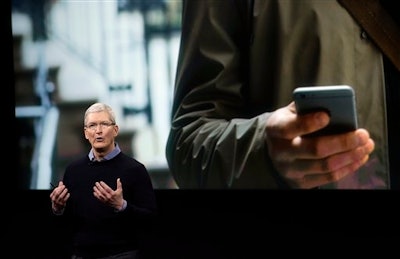 Apple CEO Tim Cook, speaks at an event to announce new products at Apple headquarters Monday, March 21, 2016, in Cupertino, Calif.