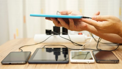 Men Connected Charger To Tablet Computer After Four Digital Devices 000085160541 Medium 56e6cf3258b2d