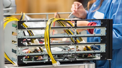 Midsection Of Female Engineer Repairing Computer 000048702996 Medium 56e192a4e2d35