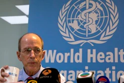 Dr. Lance Rodewald of World Health Organization (WHO) China's immunization program listens to questions during a press conference in Beijing, China. China must exert stronger oversight over vaccines sold on the private market in the wake of a developing scandal involving expired or improperly stored vaccines, the World Health Organization said Tuesday.