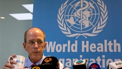 Dr. Lance Rodewald of World Health Organization (WHO) China's immunization program listens to questions during a press conference in Beijing, China. China must exert stronger oversight over vaccines sold on the private market in the wake of a developing scandal involving expired or improperly stored vaccines, the World Health Organization said Tuesday.