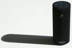 This Wednesday, March 2, 2016 photo shows an Amazon Tap in San Francisco. Amazon.com is introducing two devices, the Amazon Tap and Echo Dot, that are designed to amplify the role that its voice-controlled assistant Alexa plays in people's homes and lives.