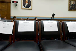 Empty reserved chairs are marked before the arrival of FBI Director James Comey, and others, on Capitol Hill in Washington, Tuesday, March 1, 2016, prior to the House Judiciary Committee hearing on 'The Encryption Tightrope: Balancing Americans' Security and Privacy.'