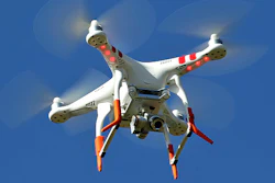 A close-up look at a drone flying over Ladhope Recreation Ground.