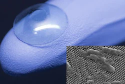 The center of an artificial cornea (on glove) is coated with tiny pillars that impale and kill bacterial cells (inset).