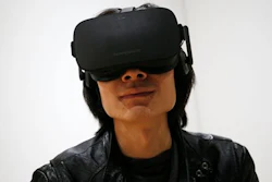 In this Jan. 6, 2016 file photo, Peijun Guo wears the Oculus Rift VR headset at the Oculus booth at CES International in Las Vegas. The consumer version of the Oculus Rift will arrive for early adopters on Monday, March 28, 2016, kicking off a new wave of high fidelity virtual reality available for people’s homes.