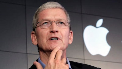 In this April 30, 2015 file photo, Apple CEO Tim Cook responds to a question during a news conference at IBM Watson headquarters, in New York. The dispute over whether Apple must help the FBI hack into a terror suspect's iPhone is about to play out in a Southern California courtroom. The hearing Tuesday, March 22, in U.S. District Court in Riverside is the first in the battle that has seen Cook and FBI Director James Comey spar over issues of privacy and national security.