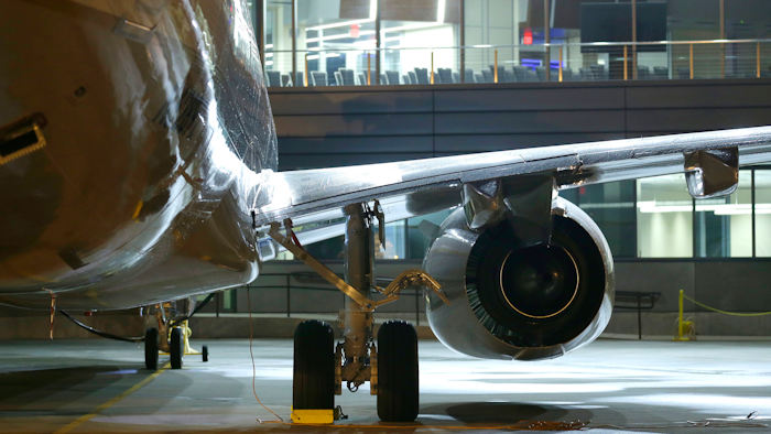 In this file photo, a new Boeing 737-900ER airplane being delivered to United Airlines is parked in front of Boeing's newly expanded 737 delivery center in Seattle. The United States recently allowed Boeing to have direct talks with Iranian airliners.