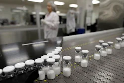 vials of the drug Kogenate FS, a medicine used to replace the clotting factor missing in people with hemophilia, move along an automated packaging line at Bayer Corporation labs in Berkeley, Calif. Bayer is increasing everything from marketing and research operations in the U.S. to the number of its nonprescription medicines in pharmacies and grocery stores.