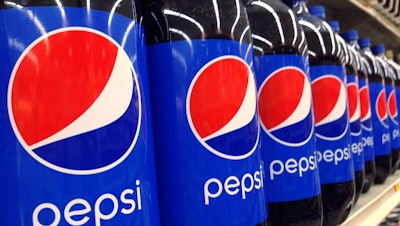 In this July 9, 2015, file photo, Pepsi bottles are on display at a supermarket in Haverhill, Mass.