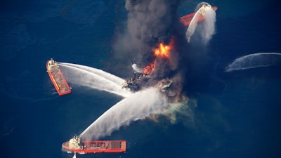In this April 21, 2010, file photo, the Deepwater Horizon oil rig burns in the Gulf of Mexico following an explosion that killed 11 workers and caused the worst offshore oil spill in the nation's history.