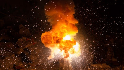 Realistic Fiery Explosion Busting Over A Black Background 000068786059 Medium 5707b1b125003