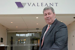 Valeant Pharmaceuticals CEO J. Michael Pearson poses at the company's annual meeting in Montreal. Valeant asked him to cooperate with a Senate investigation into drug pricing after he failed to appear for a deposition.