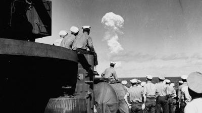 Sailors watched the Able Test burst miles out to sea from the deck of the support ship USS Fall River on July 1, 1946.