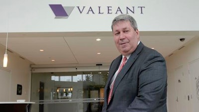 In this Tuesday, May 19, 2015, file photo, Valeant Pharmaceuticals CEO J. Michael Pearson poses at the company's annual general meeting in Montreal. Senators investigating price hikes by Valeant Pharmaceuticals will question hedge fund manager William Ackman and former finance chief Robert Schiller at a hearing scheduled for Wednesday, April 27, 2016.