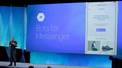In this April 12, 2016, file photo, David Marcus, Facebook Vice President of Messaging Products, talks about Bots for Messenger during the keynote address at the F8 Facebook Developer Conference in San Francisco. Facebook says people who use its Messenger chat service will soon be able to order flowers, request news articles and talk with businesses by using messaging bots.