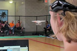 In this April 16, 2016 photo. a University of Florida student uses a brain-controlled interface headset to fly a drone during a mind-controlled drone race in Gainesville, Fla. For more than a century science has been able to detect brainwaves, but recent advances in cheaper equipment like the electroencephalogram, or EEG, headsets worn by the drone racers is moving the technology out of the lab.