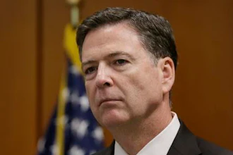 FBI Director James Comey addresses the media after visiting with employees and other law enforcement officials, Tuesday, April 5, 2016, in Detroit.