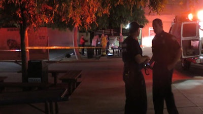 In this Monday, April, 4, 2016 photo provided courtesy of Safety For Citizens, first responders are seen on the scene, after a homemade model rocket exploded at Madrona Elementary School in Thousand Oaks, Calif. Investigators will try to piece together a homemade model rocket to figure out why it exploded at the Southern California school, killing a high school student and sending his friend to a hospital with minor injuries, authorities said Tuesday.