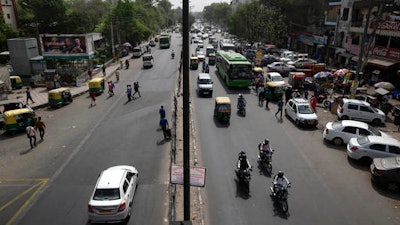 Few vehicles are seen plying on the otherwise severely busy Mehrauli Badarpur road during rush hour in New Delhi, India, Friday, April 15, 2016. The New Delhi government has begun a second round of a two-week car restriction whereby private cars will be allowed on the streets on alternate days from Friday until April 30 based on even or odd license plate numbers, to reduce air pollution that has made the Indian capital the world's most polluted city.