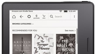 This photo provided by Amazon shows Amazon’s latest Kindle. Amazon says the new Kindle is 30 percent thinner and 20 percent lighter than previous Kindles. It’s also asymmetrical, with a grip on one side for one-handed reading.