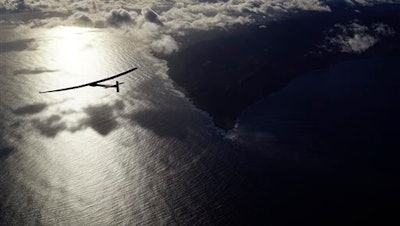 In this photo provided by Solar Impulse, the solar powered plane, 'Solar Impulse 2,' piloted by Bertrant Piccard of Switzerland, is seen in the air Thursday, April 21, 2016, after successfully taking off from Kalaeloa Airport, O'ahu, Hawaii, for a non-stop three day flight expected to cover about 3,760 kilometers (2,336 miles) to San Francisco.