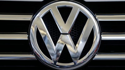 A person briefed on the matter said Wednesday, April 20, 2016, that Volkswagen has reached an agreement with the U.S. government to spend just over $1 billion to compensate owners of diesel-powered cars that cheat on emissions tests.