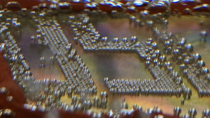 Researchers at Oregon State University using new technology to control the formation and release of bubbles illustrate it with the letters 'OSU' being printed on a substrate.