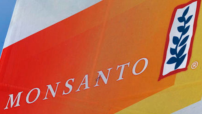 This Aug. 31, 2015, file photo, shows the Monsanto logo seen at the Farm Progress Show in Decatur, Ill. Monsanto is rejecting Bayer's $62 billion takeover bid, calling it 'incomplete and financially inadequate. However, the seed company suggested Tuesday, May 24, 2016, that a higher bid might be accepted, saying that it remains open to talks.