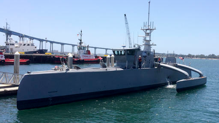 A self-driving, 132-foot military ship sits at a maritime terminal Monday, May 2, 2016, in San Diego. The Pentagon's research arm is launching tests on the world's largest unmanned surface vessel designed to travel thousands of miles out at sea without a single crew member on board.