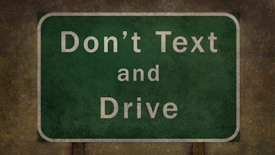 Don T Text And Drive Road Sign With Ominous Distressed Treatment 000042874354 Full 573490334f2b3