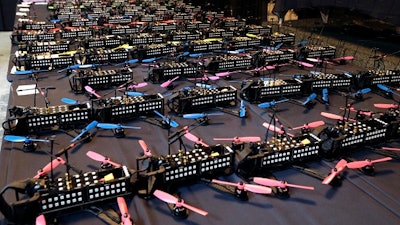 Drones are readied prior to races held by the Drone Racing League at a vacant mall in Hawthorne, Calif. In drone racing, a crash means bits of plastic go flying, a replacement is grabbed, and no harm done. For now, bragging rights are the main stakes. Drone racing leagues would love to follow sports like poker into the mainstream with big TV audiences and sponsorships. But getting sponsors and fans is also a race against time.