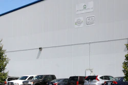 This May 11, 2016 photo shows the outside of CRF Frozen Foods, LLC, in Pasco, Washington. The company shut down its processing operations over a listeria breakout that has sickened customers in several states.