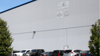 This May 11, 2016 photo shows the outside of CRF Frozen Foods, LLC, in Pasco, Washington. The company shut down its processing operations over a listeria breakout that has sickened customers in several states.